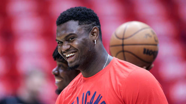 Pelicans star Zion Williamson laughs during warmups.