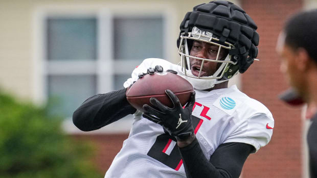 Aug 1, 2022; Flowery Branch, GA, USA; Atlanta Falcons tight end Kyle Pitts (8) catches a pass during training camp at IBM Performance Field.