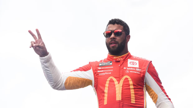 Aug 7, 2022; Brooklyn, Michigan, USA; NASCAR Cup Series driver Bubba Wallace (23) is introduced before the race at Michigan International Speedway.