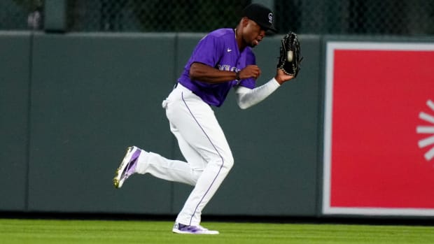 Rockies rookie Wynton Bernard catches ball during MLB debut.