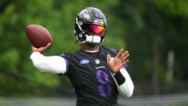 Jul 29, 2022; Owings Mills, MD, USA; Baltimore Ravens quarterback Lamar Jackson (8) practices at the Under Armour Performance Center.