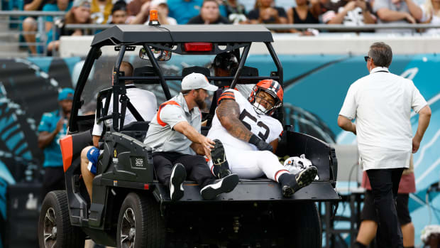 Aug 12, 2022; Jacksonville, Florida, USA; Cleveland Browns center Nick Harris (53) is carted off the field during the first quarter of a preseason game against the Jacksonville Jaguars at TIAA Bank Field.