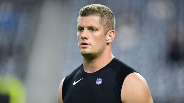 Raiders defensive end Carl Nassib (94) before playing against the Chiefs at Allegiant Stadium.
