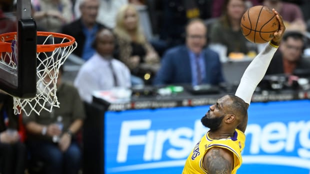 Mar 21, 2022; Cleveland, Ohio, USA; Los Angeles Lakers forward LeBron James (6) dunks in the fourth quarter against the Cleveland Cavaliers at Rocket Mortgage FieldHouse.